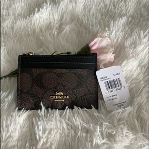 Coach Mini Skinny Id Case Brown and Black. New with tag.